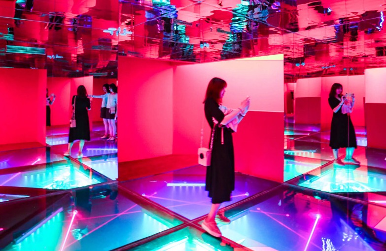 Youth-led pop-up gallery with students guiding visitors through the exhibition space.